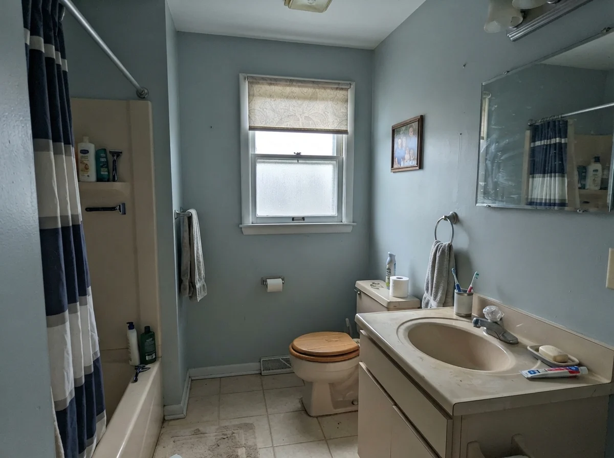 Bathroom in cool north light with beige vanity and cool cast on Smoke walls
