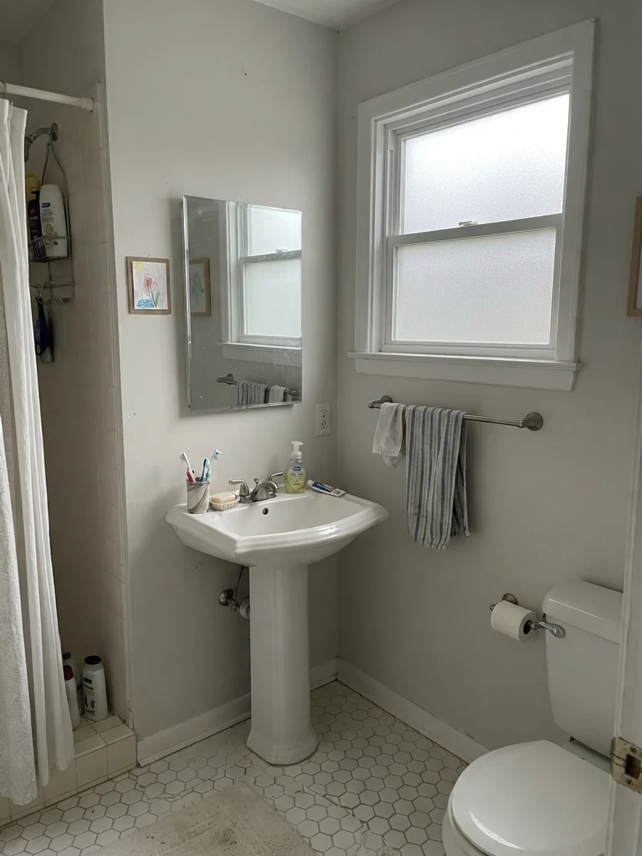 Small bathroom with White Dove looking slightly grey in flat overcast light