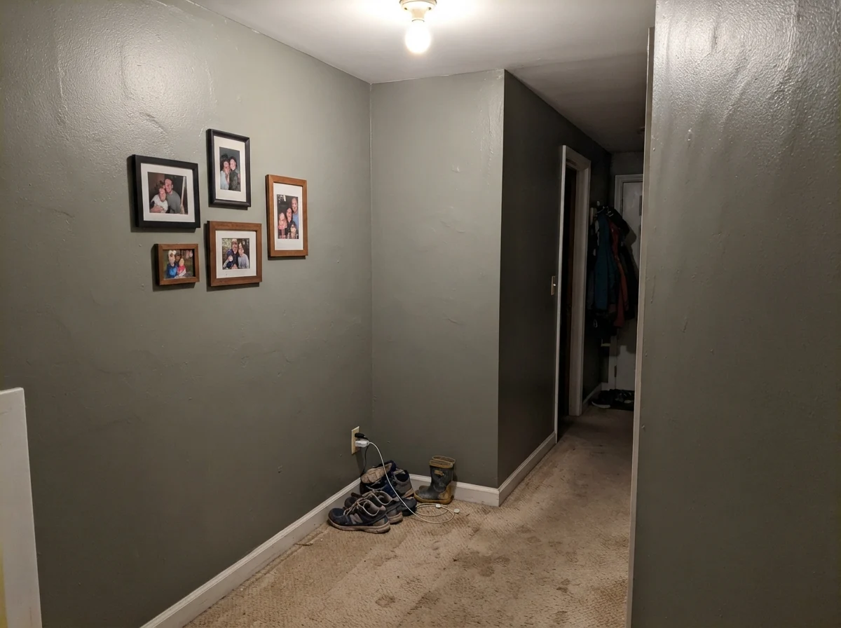 Windowless hallway showing Dried Thyme looking muddy and dark gray under artificial bulb light.